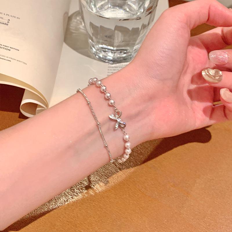 Elegant Silver Bow Double-Layer Pearl Bracelet - High-End, Versatile, Stackable Fashion Accessory
