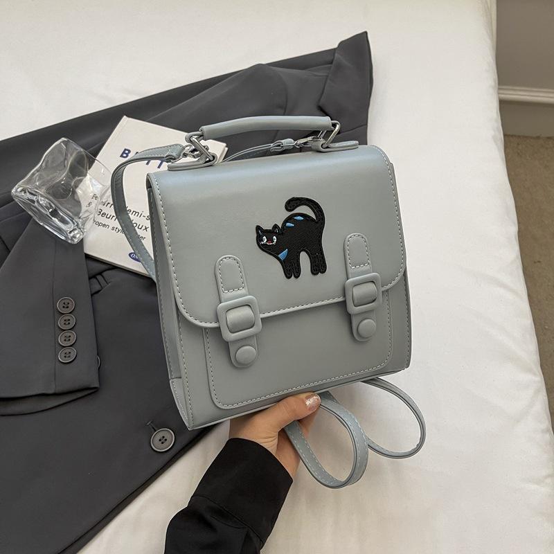 

Ретро рюкзак женский новый осенний на плечо контрастного цвета нишевая мультяшная сумка-тоут синий