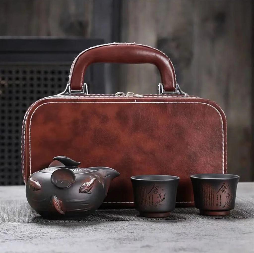 Yunnan handmade purple pottery full of industrial carving travel tea set, one pot and two cups, portable hand-held teapot, outdoor travel tea