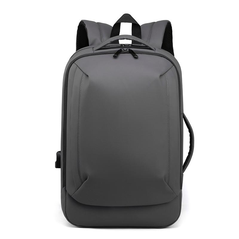 Neue Business-Computertasche, schlichte und modische spritzwassergeschützte Ladeschnittstelle, Rucksack, Lederfolie, Rucksack mit großem Fassungsvermögen.