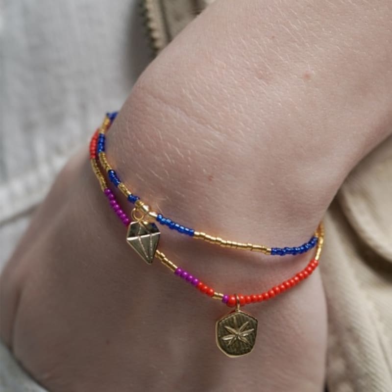 

BONBEAU Dia Motives 18k gold beads bracelet free