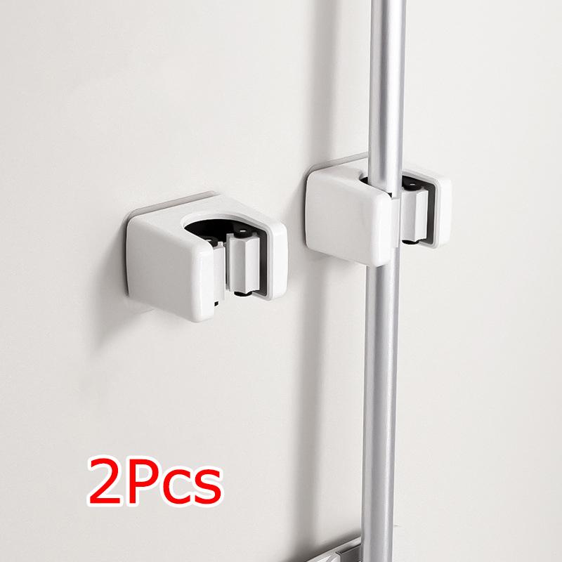 

2 шт./уп. Органайзер для ванной комнаты, подвесной держатель для швабры, кухонный, без сверления, для хранения швабры, зажим для швабры-зонтика, кухонная утварь, порядок