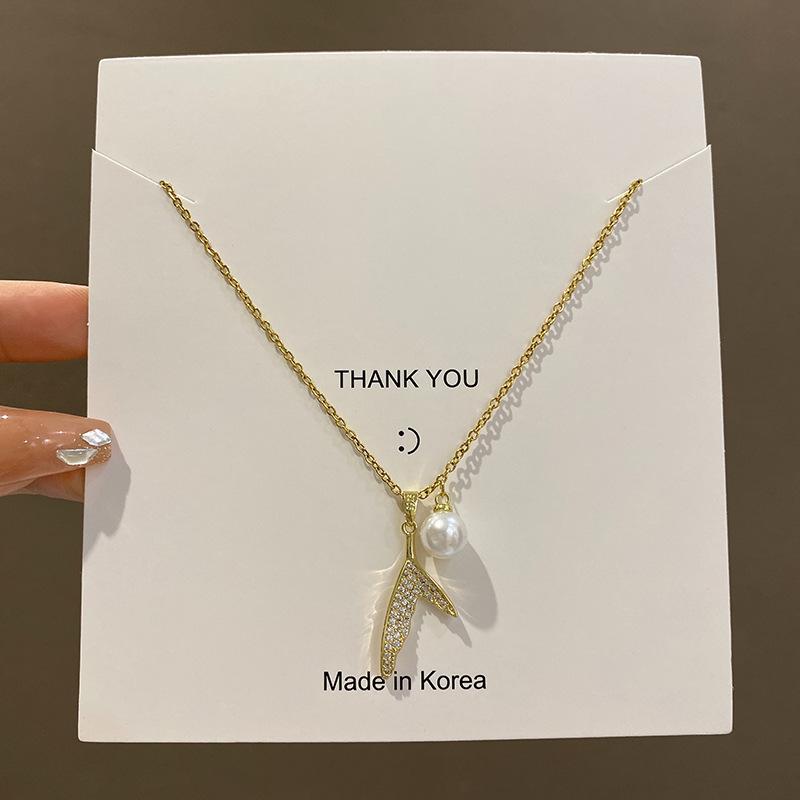 

Years Fish Tail Pearl Necklace Women s Premium Sense Niche Titanium Steel Clavicle Chain Retro Matching