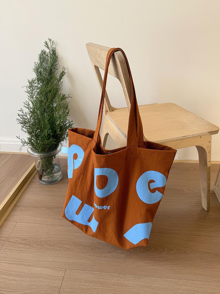 

New spring college sports style satchel contrasting color letter tote bag large capacity shoulder casual fashion women s bag tide