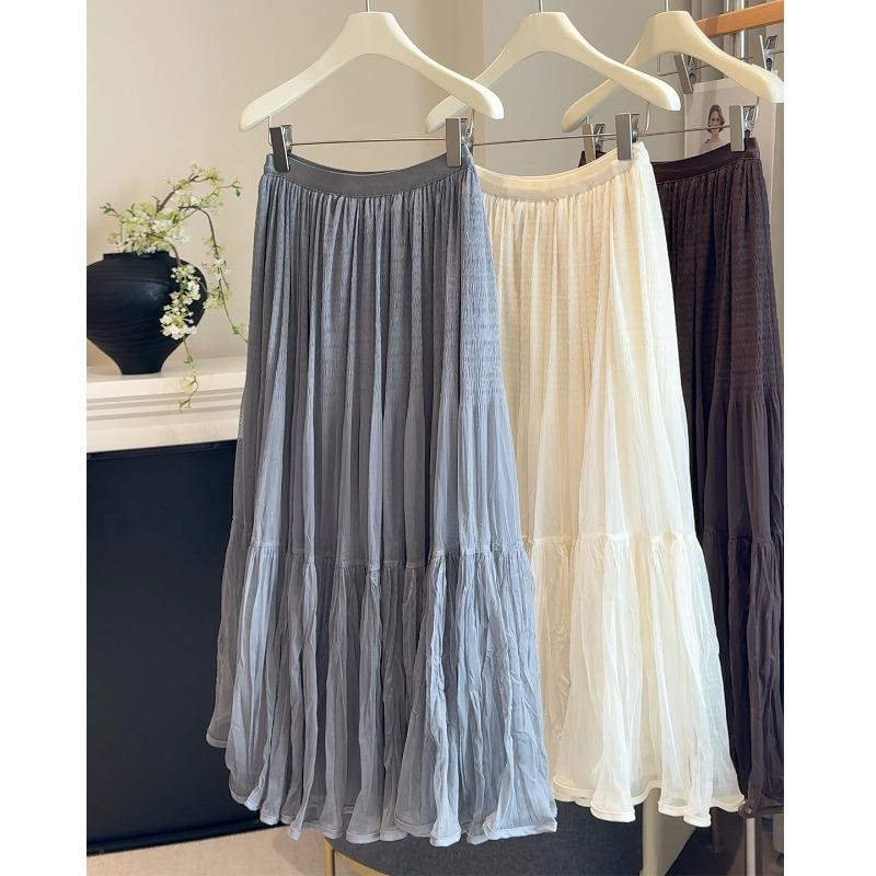 New high-end pleated mesh stitching A-shaped skirt women's autumn elastic waist solid color versatile medium and long fairy skirt