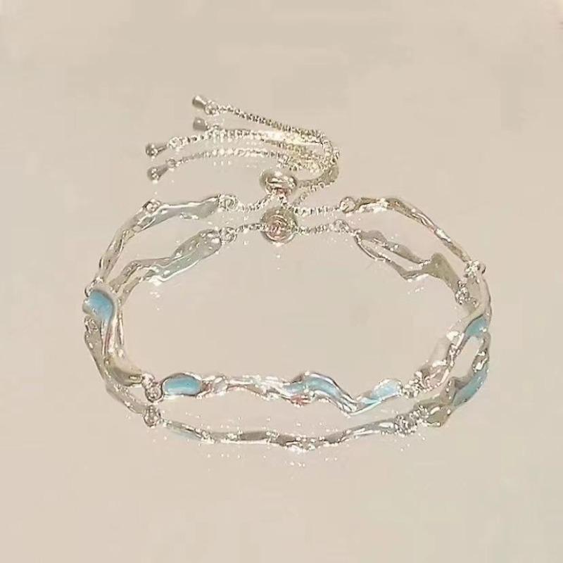 Zirconia Cherry Blossom Bow Bracelet - Elegant and Exclusive Style, with A Touch of Sophistication and A Touch of Coldness.