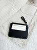 Slim lightweight zipper pouch made of premium material, practical for storing cards, cash and small change, portable design
