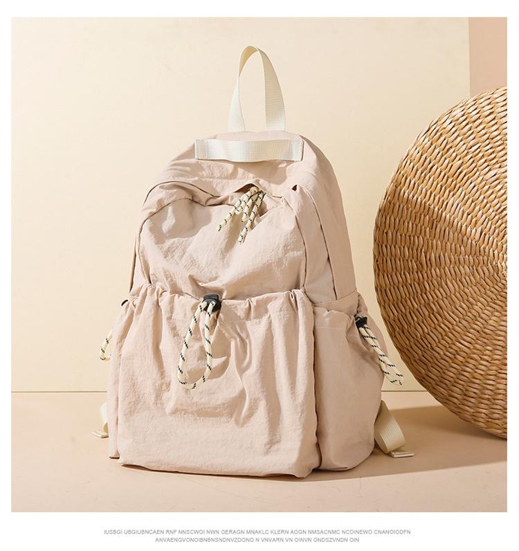 

Korean version of Harajuku large-capacity casual and lightweight backpack new solid color simple fashion trend travel backpack
