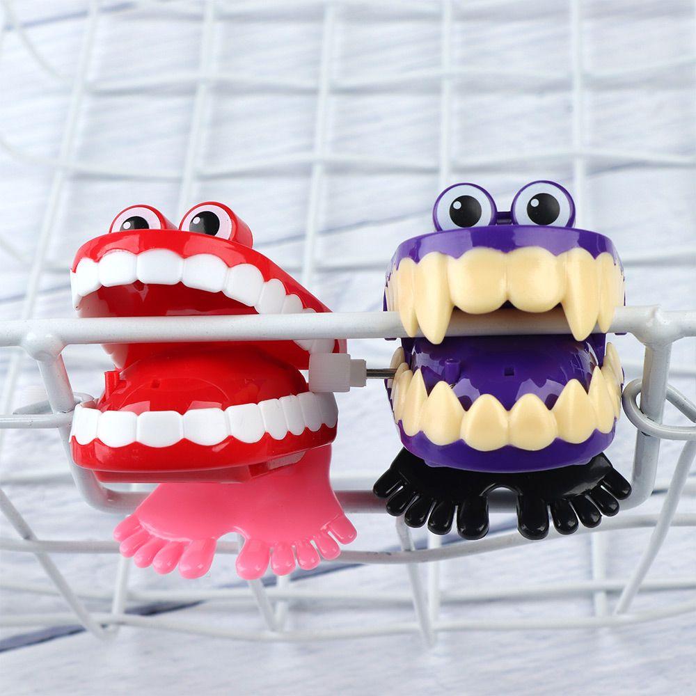 thumbnail image 2 of Novelty Funny Wind Up Walking Wind Up Teeth With Eyes Feet 2 of 10