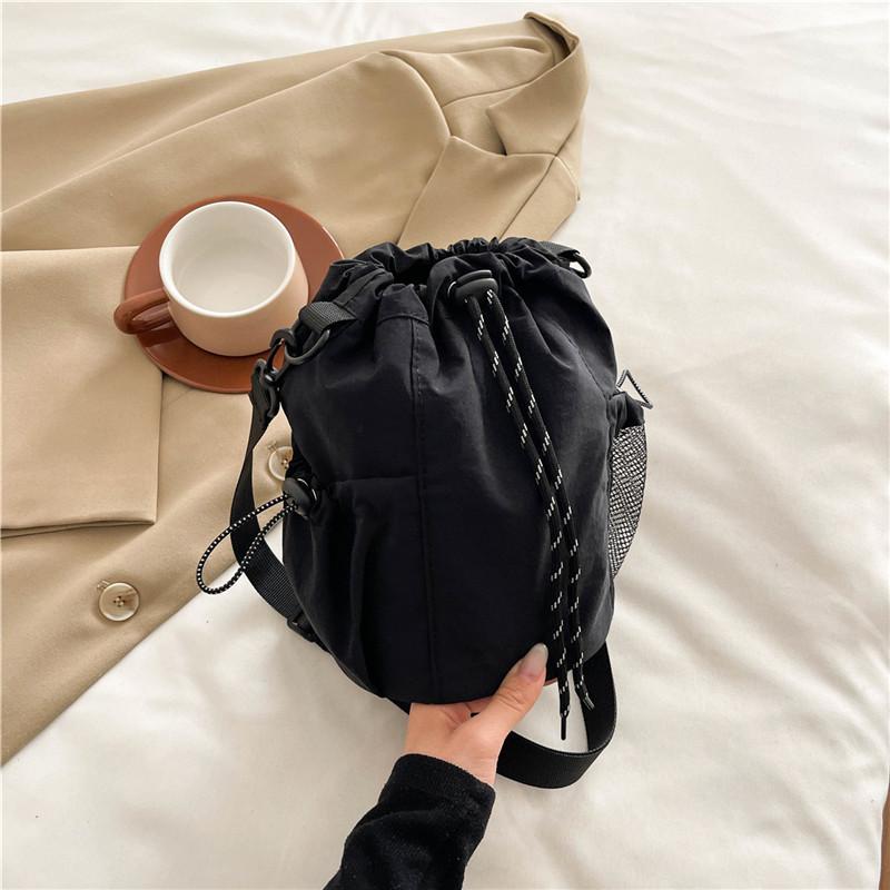 Wersja koreańska nowej torby ze sznurkiem damski trend mody na jedno ramię crossbody torba typu bucket na wyjścia casualowa przenośna torba na telefon