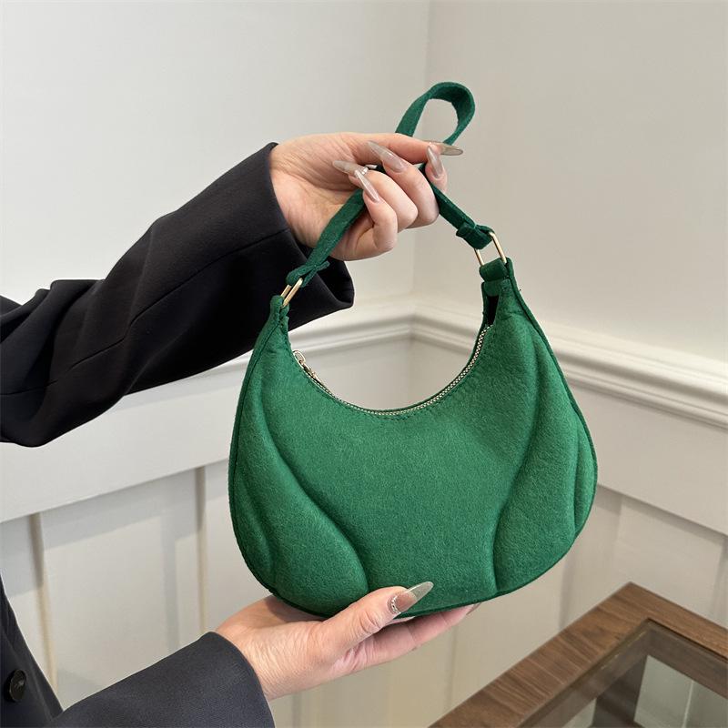 This Year's Trendy Women's Minimalist Dumpling Bag - a New Korean-style Shoulder Bag with Niche Fashion and Elegant Underarm Design.
