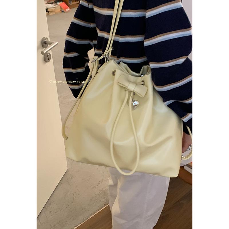 Korean version of large-capacity bucket bag 2025 new solid color niche simple casual shoulder bag multi-functional backpack