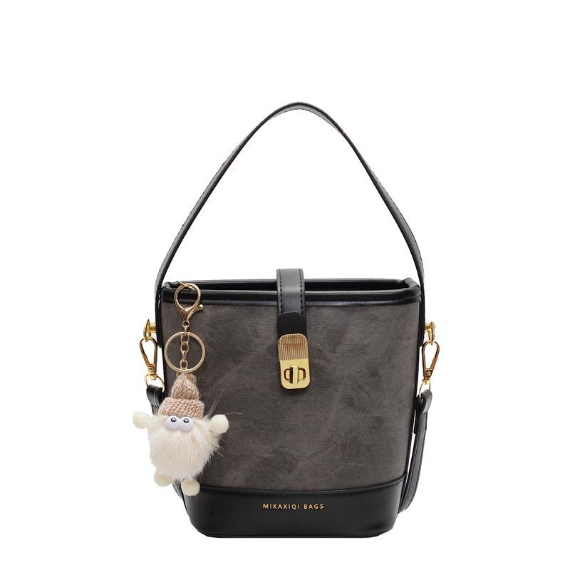 New bag women's bucket bag spring and summer niche design messenger bag high-end sense work small bag