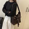 Summer large-capacity high-end sense commuting bucket bag women's 2025 new white leather bow messenger bag