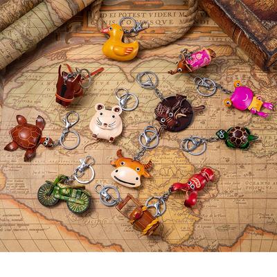Nuovo portachiavi animale mini in pelle bovina di primo strato, ciondolo creativo fatto a mano per borsa, portachiavi per auto, universale