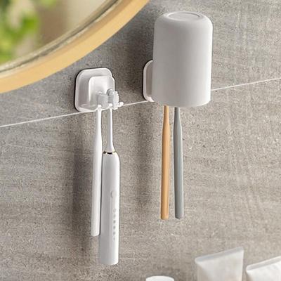 Japanese-Style Wall-Mounted Toothbrush and Mouthwash Cup Holder - Punch-Free Electric Toothbrush Storage and Drain Rack.