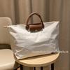 Xiangjia Large-Capacity Waterproof Oxford Travel Tote Bag, Lightweight and Foldable.