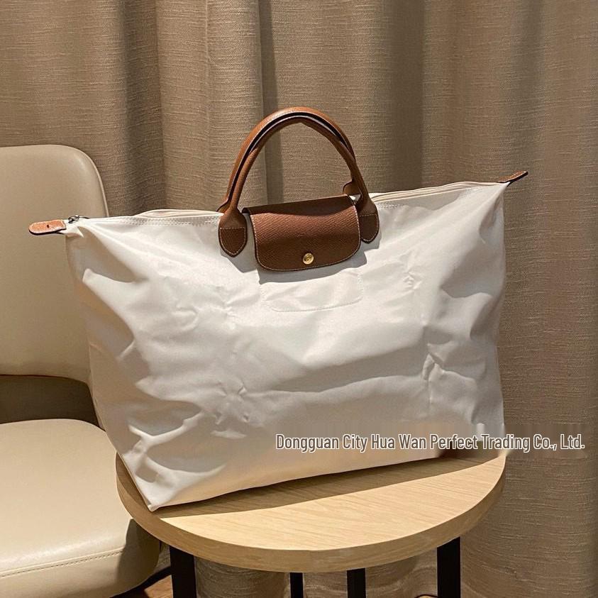 Xiangjia Large-Capacity Waterproof Oxford Travel Tote Bag, Lightweight and Foldable.