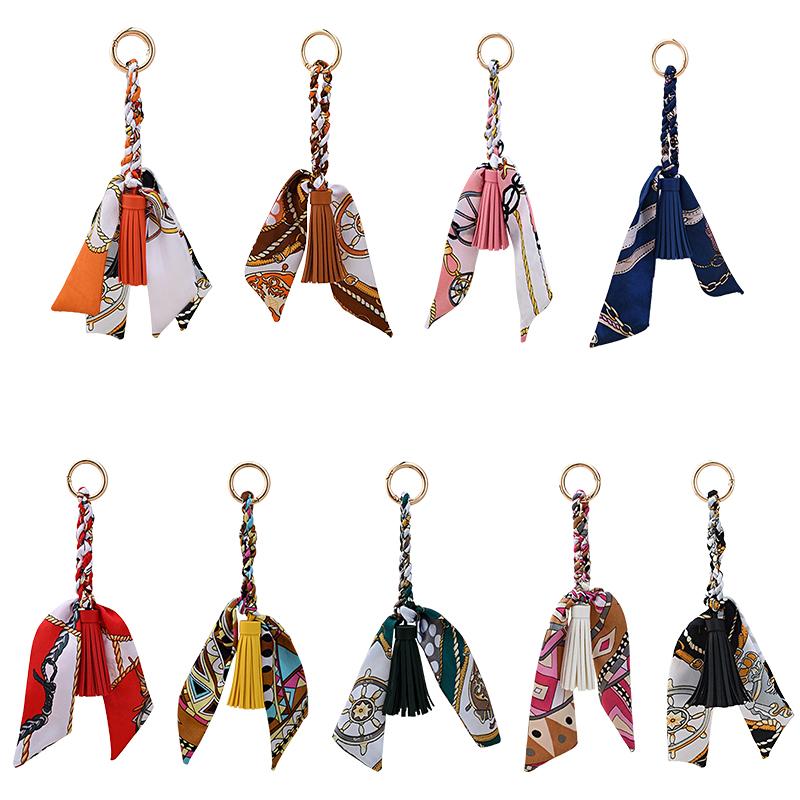 Femme Alliage Tissé à la Main Polyester Pendentifs Sac Cadeau Créatif Porte-clés Supports Ornement Ruban de Soie Porte-clés Personnalité 9 Couleurs