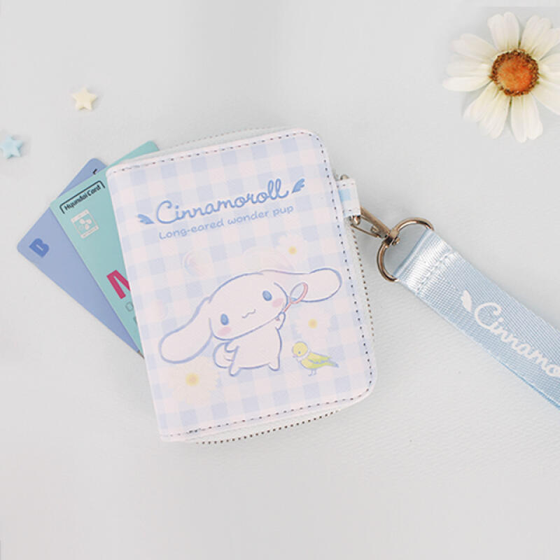 

Гаманець Cinnamoroll з ремінцем-ромашкою (Блакитне небо)
