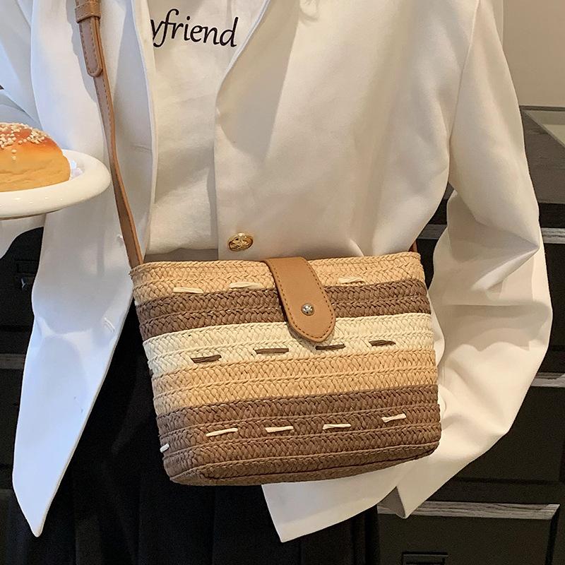 Portable woven straw bag women's 2025 new versatile high-end spring summer seaside vacation beach bag