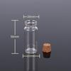 Kleine durchsichtige Glasflasche mit Korken