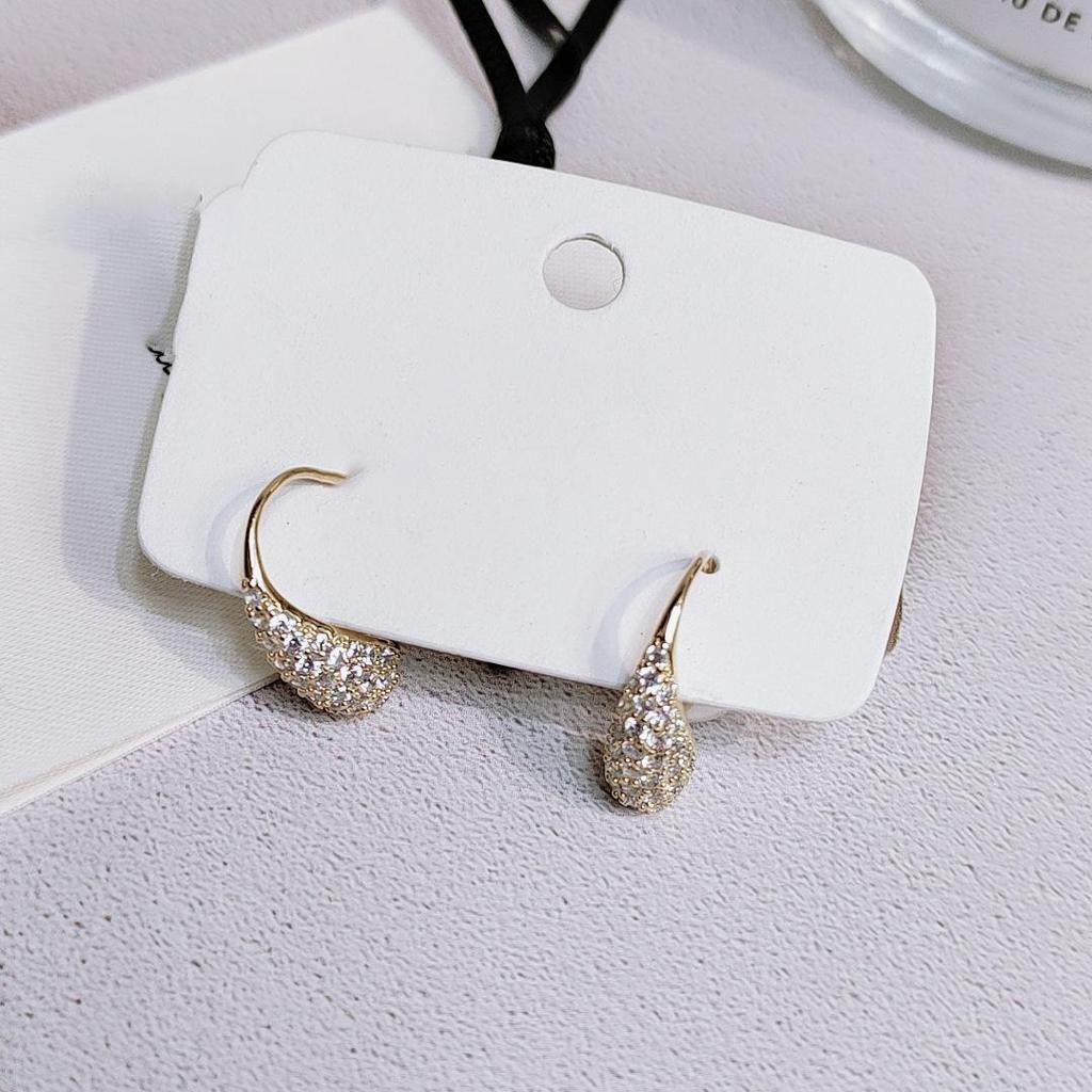 Elegant Zirconia Water Drop Copper Earrings for Women - Versatile, Fashionable, and High-End Feel.