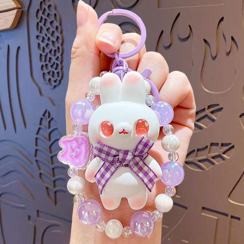 

Cartoon Beaded Cute Rabbit Couple Car Bag Key Chain Pendant Creative Small Gift Keychain Opp bag packaging
