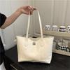 Large Capacity Tote Bag for Women, 2026 New Fashiable and Simple Embossed Handbag, Casual Commuting Armpit Shoulder Bags