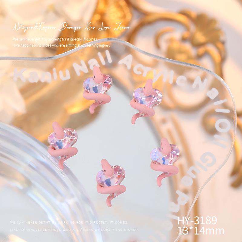 

Удерживание ногтей в форме змеи с бриллиантами Удерживание бриллиантов в форме маленькой змеи Готовые украшения для ногтей Трехмерная маленькая змея Круглое изогнутое сердце с бриллиантами