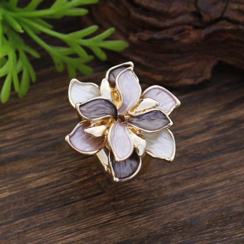 New enamel color hollow geometric daffodil elastic ring women's fashion high-end flower ring