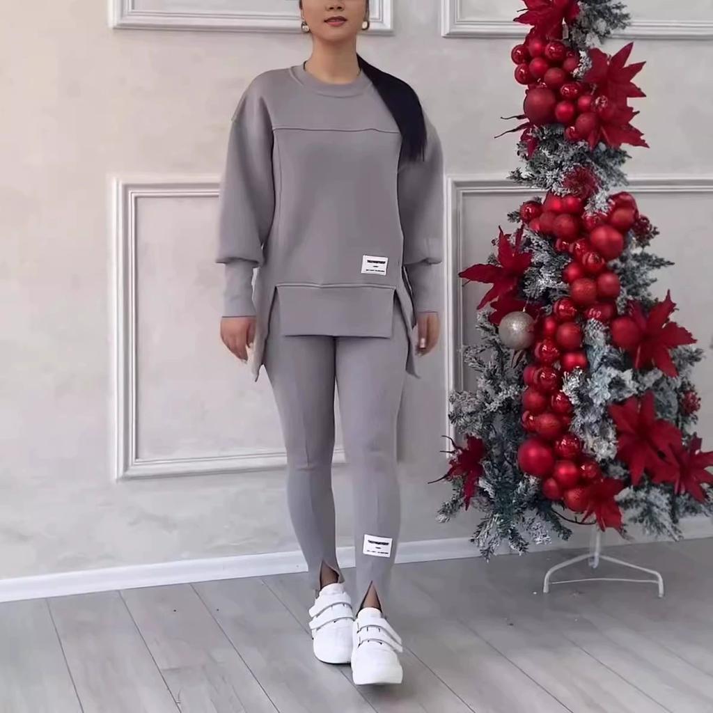 Damesett med uregelmessig trykket hettegenser med lange ermer og leggings