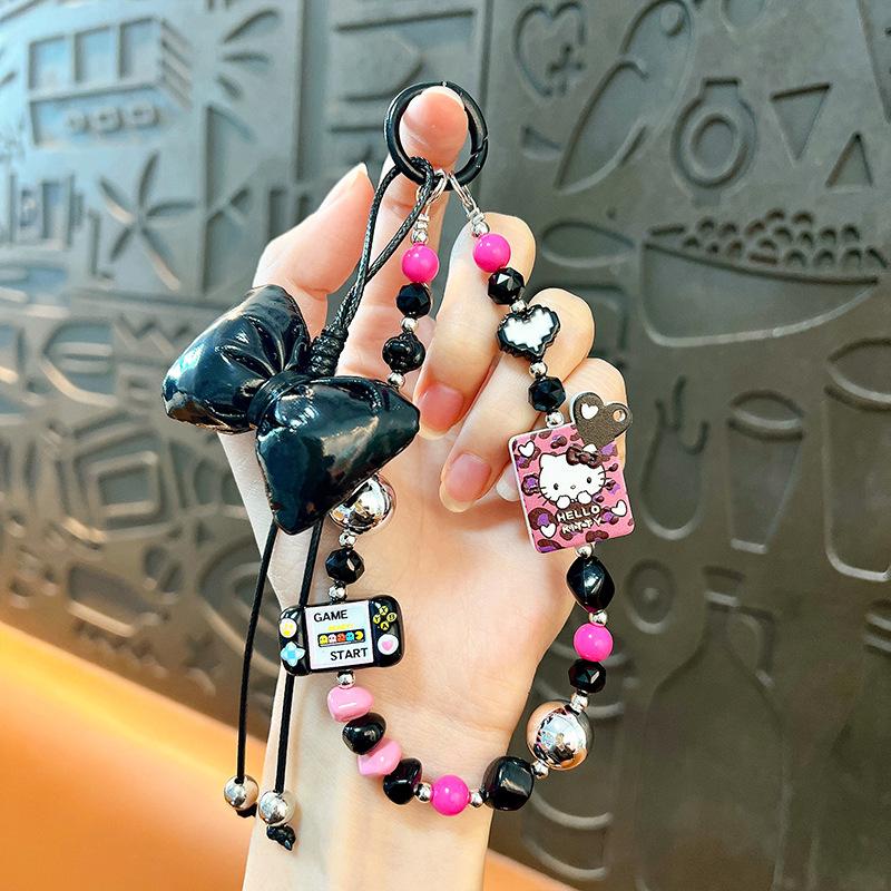 Creative new cat bow beaded mobile phone chain keychain exquisite cute bag pendant small gift wholesale