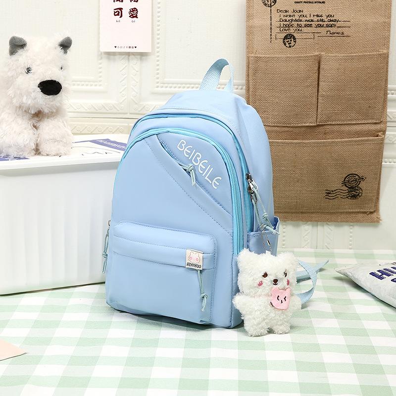 

Children s schoolbag new fashion simple backpack primary school students lightweight burden reduction kindergarten backpack travel research bag