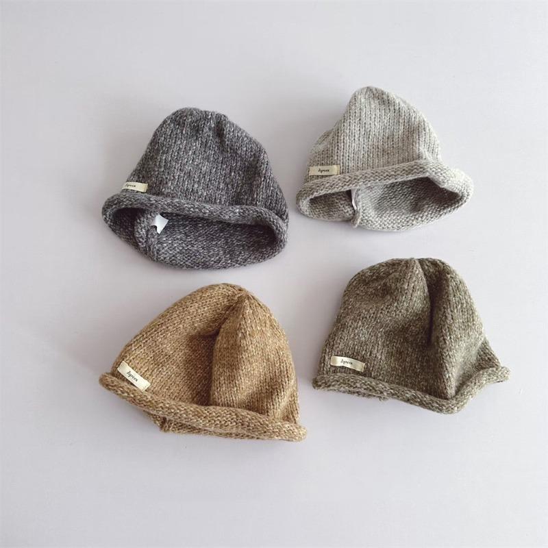 Jungen und Mädchen Baby einfache Retro Strickmütze Han Fan warm gesäumte Wollflor Mütze Tide