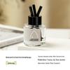 Niche Aromatherapy Car Freshener: High-End Interior Ornament with Long-Lasting Light Fragrance and Odor Removal.