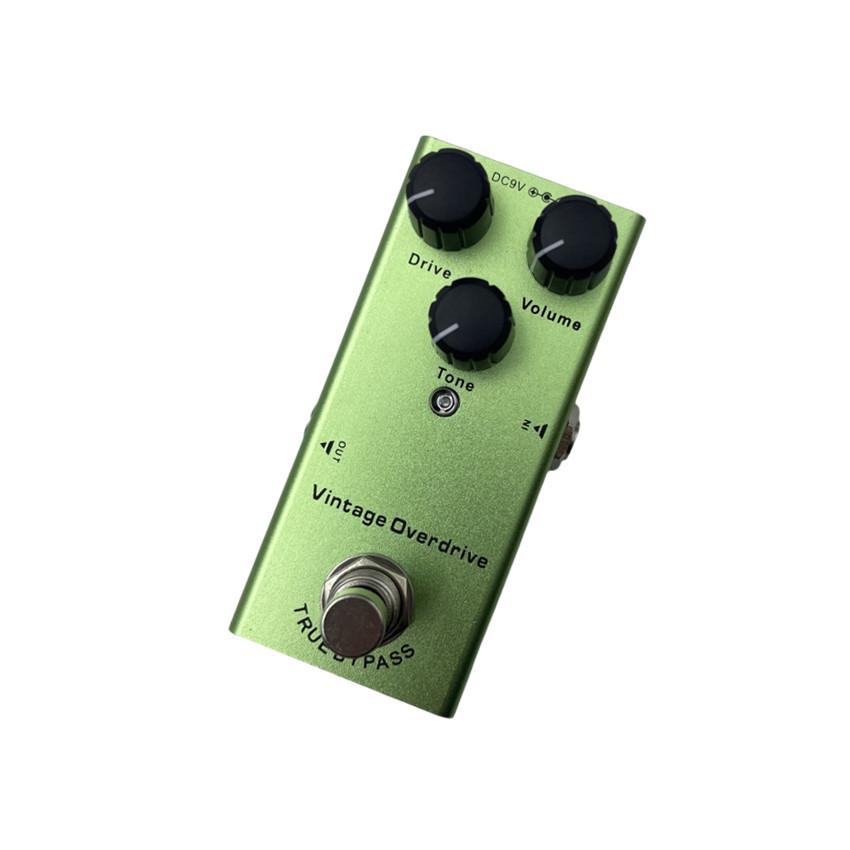 Compact Professional Electric Guitar Effects Pedal with 10 Effects: Distortion, Delay, Chorus, Vibrato, and Sound Simulator.