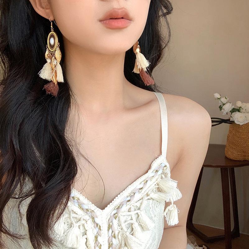 Bohemian ethnic style fringed earrings long niche woven feather earrings new travel wear earrings women