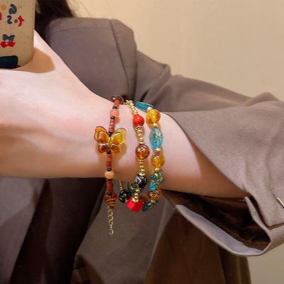 Retro ethnischer Stil Blume Schmetterling Perlenarmband Damen Designarmband personalisiert Hand
