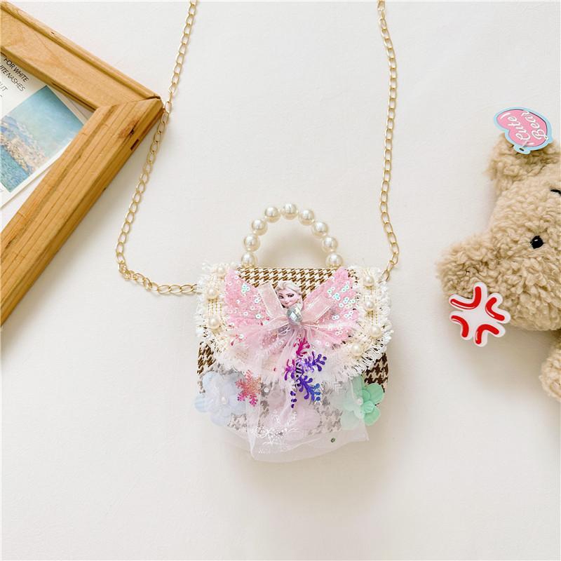 Stilvoller Prinzessinnen-Rucksack für Mädchen, verziert mit Perlen und Cartoon-Mustern in lebendigen Farben