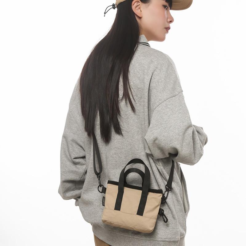 Crossbody bag women's small bag 2025 new foreign style personalized solid color portable simple shoulder bag trendy casual bucket bag