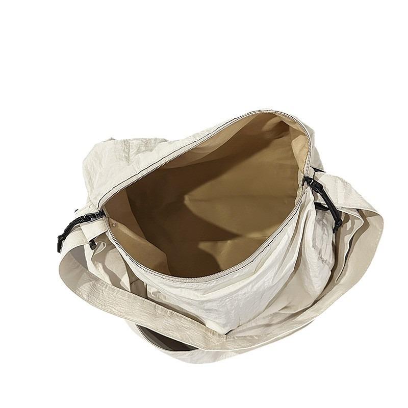 Crossbody bag New couple casual mailman bag Large capacity short trip bag Sports shoulder bag