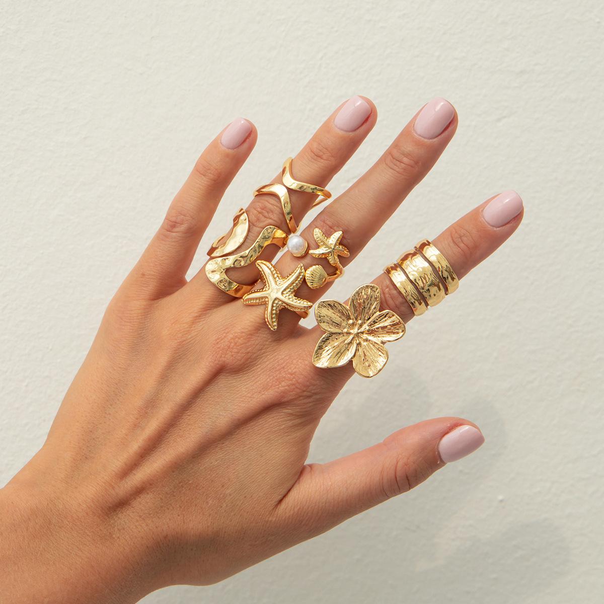 

Alloy ring set, European and American new ocean style accessories, women s niche design sense, sun starfish ring