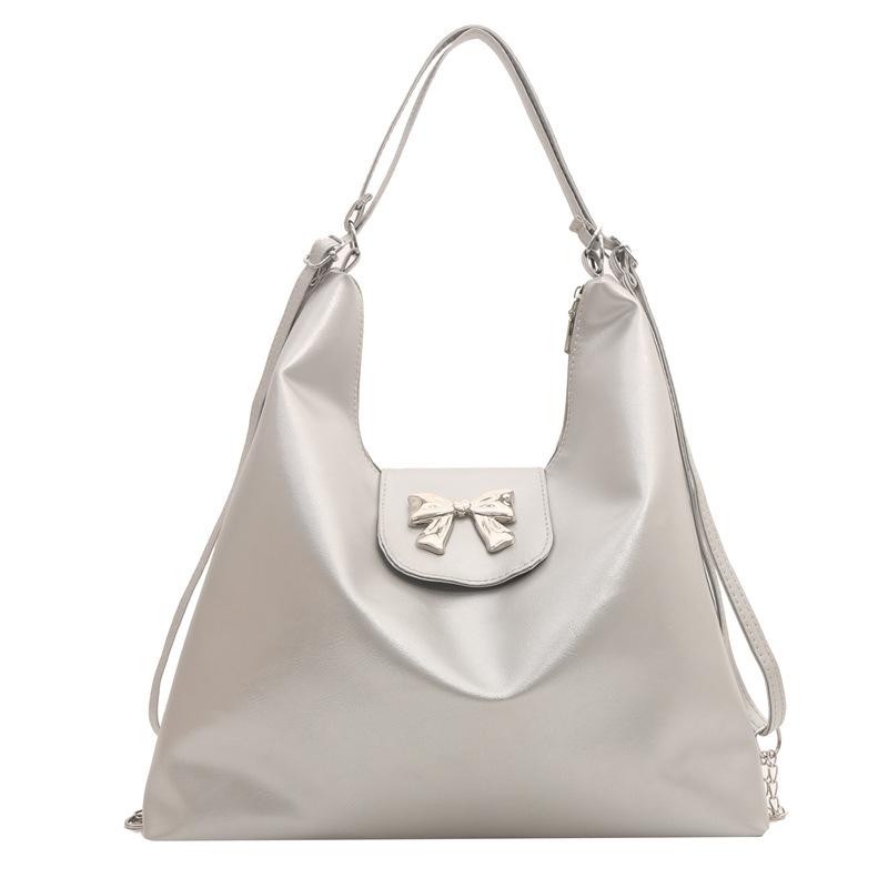 

Корейська версія модного повсякденного міського рюкзака великої місткості для жінок 2024, нова весняно-літня ніша, проста коса сумка через плече срібний