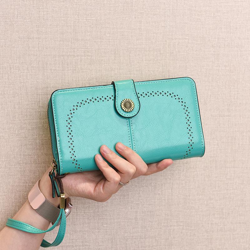 Trendige hohle lange Reißverschluss-Damenbrieftasche & Clutch mit großem Fassungsvermögen