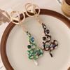 Retro Personalized Oil Drip Diamond Zodiac Snake Car Keychain Bag Pendant