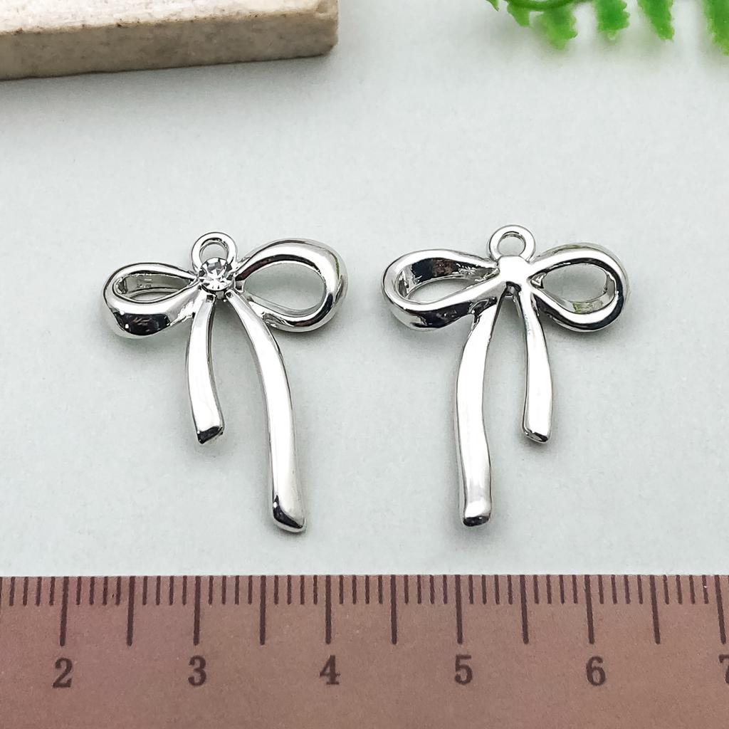 Hängender Vergoldeter Farbechthaltender Diy Schleife Hohl Anhänger Anhänger, Legierung Halskette, Armband, Ohrringe, Handgefertigter Schmuckzubehör