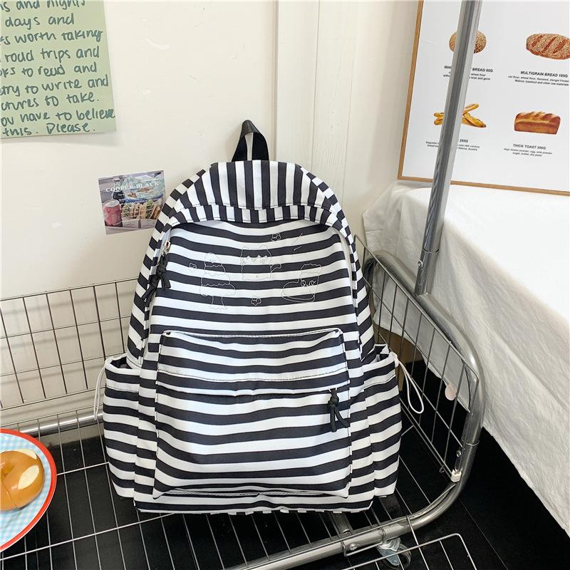 The New Schoolbag Is High-value, Fresh and Sweet, Striped Backpack, Lightweight and Large-capacity Backpack for Junior and High School Students.