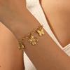 Gold Multi Charm Paperclip Chain Bracelet with Heart Butterfly and Flower