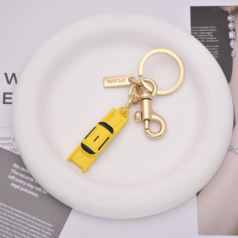 C Brand New York Bus & Eiffel Tower Charm Keychain